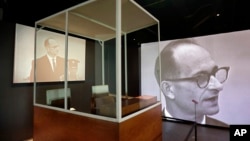 The bulletproof glass booth in which Adolf Eichmann testified during his trial in Jerusalem District Court is displayed in the "Operation Finale: The Capture & Trial of Adolf Eichmann" exhibit at the Museum of Jewish Heritage in New York, July 14, 2017. 