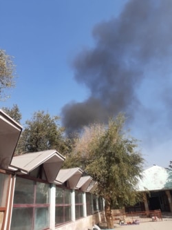 Smoke billows near the Sardar Mohammad Daud Khan National Military Hospital after an explosion in central Kabul, Afghanistan Nov. 2, 2021.