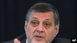 Jan Kubis, the United Nations special representative in Afghanistan, gestures during a news conference in Kabul, February 4, 2012.