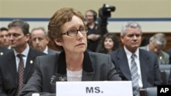 GSA Administrator Martha Johnson testified before Congress about lavish government spending at a regional conference in Las Vegas. She and two top aides resigned.