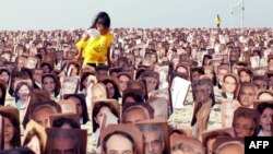 Members of the Baha'i religion demonstrate in Rio de Janeiro, June 19, 2011, asking Iranian authorities to release seven Baha'i prisoners accused of spying for Israel and sentenced to 20 years in jail.