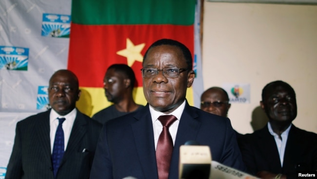 Maurice Kamto, a presidential candidate of Renaissance Movement (MRC), reacts as he holds a news conference at his headquarter in Yaounde, Cameroon, Oct. 8, 2018.