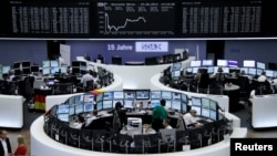 The curve of the German share price index DAX board, is pictured at the Frankfurt stock exchange, June 23, 2014. 
