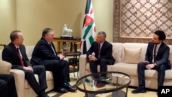Secretary of State Mike Pompeo, second from left, meets with King Abdullah of Jordan, second from right, Tuesday, Jan. 8, 2019, in Amman, Jordan. 