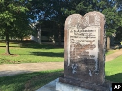 A 6-foot-tall, privately funded Ten Commandments monument is seen on the Arkansas Capitol grounds, June 27, 2017, in Little Rock.