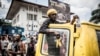 Les partisans de l'Union pour la démocratie et le progrès social - UDPS (République démocratique du Congo) se rassemblent devant le siège du parti alors qu'ils réclamaient la déclaration de leur dirigeant à Kinshasa le 21 décembre 2018