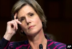 FILE - Then-Deputy Attorney General Sally Yates listens while testifying on Capitol Hill in Washington, Oct. 19, 2015.