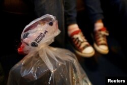 FILE - A bag containing the belongings of an undocumented immigrant family from Guatemala is pictured after their arrival to Annunciation House, an organization that provides shelter to immigrants and refugees, in El Paso, Texas, Jan. 17, 2017.