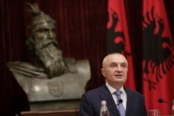 FILE - Albanian President Ilir Meta speaks during a news conference in Tirana, June 10, 2019.