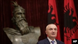 FILE - Albanian President Ilir Meta speaks during a news conference in capital Tirana, Albania, June 10, 2019. 