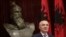 FILE - Albanian President Ilir Meta speaks during a news conference in capital Tirana, Albania, June 10, 2019. 