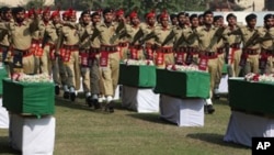 Caskets of Pakistani soldiers killed in the NATO air strike are honored in ceremony.