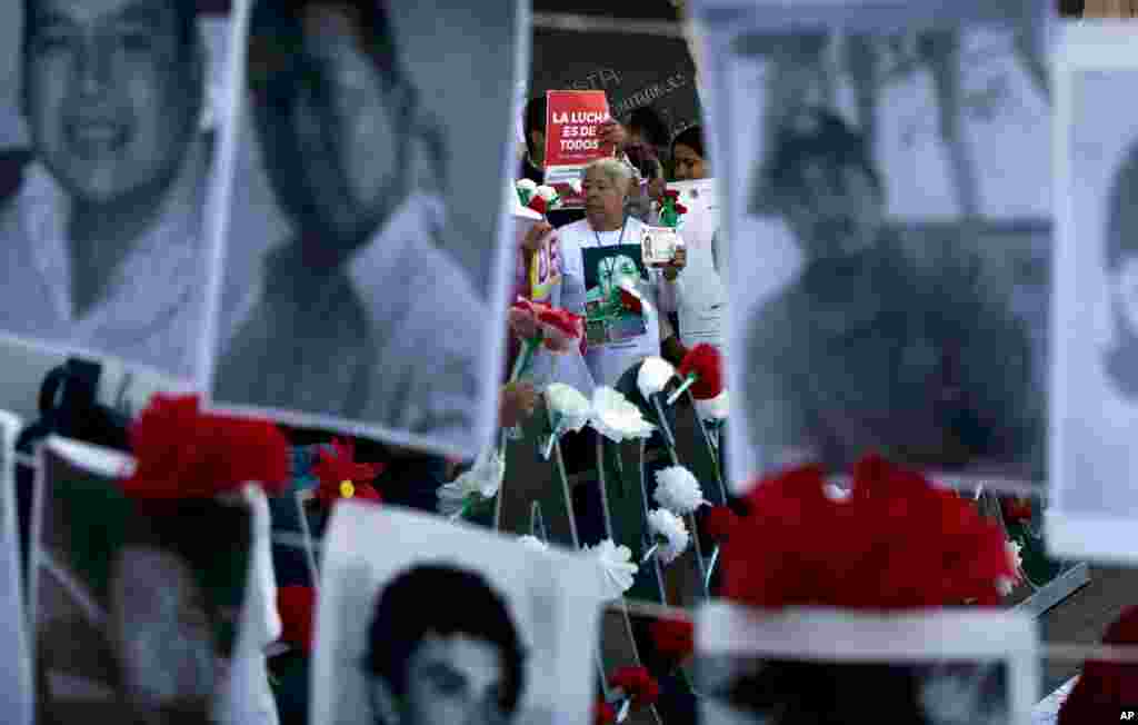 Relatives of the disappeared protest in front of the National Palace in Mexico City, Mexico. Demonstrators presented a petition to demand that the disappeared be found and identified.