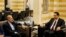 Lebanese Prime Minister Hassan Diab, right, meets with Iranian Parliament Speaker Ali Larijani, in Beirut, Lebanon, Feb. 17, 2020. 