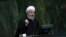 FILE - Iranian President Hassan Rouhani speaks as he submits next year's budget bill to parliament in Tehran, Iran, Tuesday, Dec. 25, 2018. 