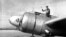 A March 10, 1937 photo of American aviator Amelia Earhart waving from the Electra before taking off from Los Angeles, California.