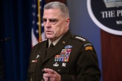 FILE - U.S. Joint Chiefs Chairman Gen. Mark Milley addresses reporters at the Pentagon in Arlington, Va., Oct. 11, 2019.