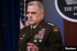 FILE - U.S. Joint Chiefs Chairman Gen. Mark Milley addresses reporters at the Pentagon in Arlington, Va., Oct. 11, 2019.