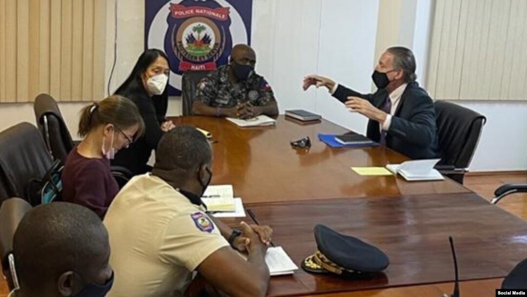 U.S. Special Envoy Daniel Foote meets with National Police Chief Leon Charles, U.S. Ambassador Michele Sison and a police official in Haiti over the weekend, in this image posted by the national police on Twitter on July 24, 2021.