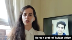 Screen grab of May 5, 2020, Twitter video in which Aida Younesi, Britain-based sister of student Ali Younesi whom Iranian authorities detained on April 10, 2020, criticizes Iran's treatment of her brother, seen on screen behind her.