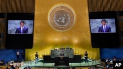 FILE - Qatar Amir Sheikh Tamim bin Hamad Al Thani addresses the 79th session of the United Nations General Assembly, Sept. 24, 2024.