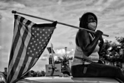 Photojournalist Vanessa Charlot is being honored for her work covering protests, including this image she named The American Patriot. (Credit: Vanessa Charlot)