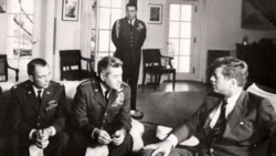 Military officers meet with President John F. Kennedy at the White House in 1962 to discuss U-2 spy plane flights over Cuba