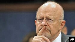 Director of National Security James Clapper testifies before the House Intelligence Committee hearing on worldwide threats, on Capitol Hill in Washington, February 2, 2012.