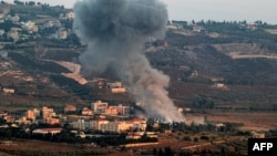 Oblaci dima sukljaju tokom izraelskog bombardovanja sela Khiam u južnom Libanu u blizini granice s Izraelom 23. juna 2024.