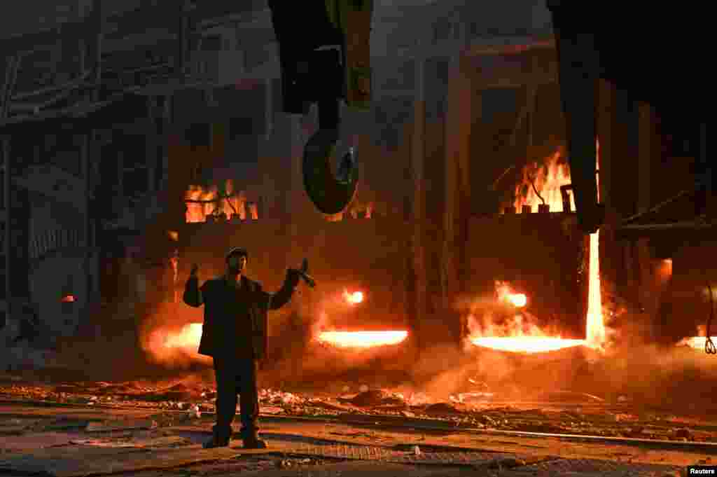 An employee operates at a production facility of Zaporizhstal Iron and Steel Works, amid Russia's attack on Ukraine, in Zaporizhzhia, Ukraine, Nov. 13, 2024. 