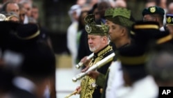 FILE -The 17th King of Malaysia, Sultan Ibrahim Iskandar, center, participates in his coronation at the National Palace in Kuala Lumpur, Malaysia, July 20, 2024. 