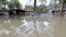FILE - A car is submerged in floodwaters in the aftermath of Hurricane Harvey near the Addicks and Barker Reservoirs in Houston, Sept. 4, 2017. 