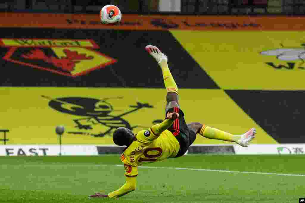 Walford's Danny Welbeck scores his team's second goal during the English Premier League soccer match between Watford and Norwich City in Watford, England, July 7, 2020.