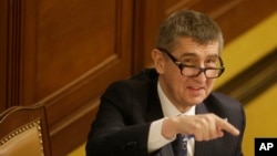 FILE - Andrej Babis, then the finance minister of the Czech Republic, gestures prior to a session of Parliament's lower house in Prague, March 23, 2016.