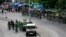 Thai soldiers secure the bus stop area to prevent the anti-coup demonstration at Victory Monument in Bangkok, May 29, 2014.