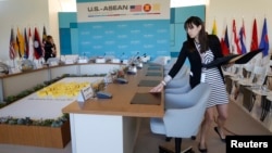 A worker prepares the meeting room for today's Association of Southeast Asian Nations (ASEAN) summit hosted by U.S. President Barack Obama at Sunnylands in Rancho Mirage, California February 15, 2016.