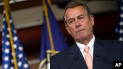 FILE - Speaker of the House John Boehner, R-Ohio, speaks with reporters on Capitol Hill in Washington, July 9, 2015. 