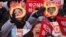 South Korean protesters shout slogans during a rally calling for South Korean President Park Geun-hye to step down in Seoul, South Korea, Nov. 26, 2016.