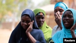 FILE - Boko Haram attacks on the Nigerian town of Gulak forced these women to flee to a refugee camp in September. The African Union is finalizing a plan for a 7,500-strong regional force to fight the Islamic extremist group. 