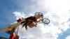 A cyclist rides the &quot;Space Bikes&quot; attraction on the eve of World Bicycle Day in Brussels, Belgium.