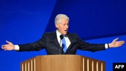 Former US President Bill Clinton gestures as he speaks on the third day of the Democratic National Convention (DNC) at the United Center in Chicago, Illinois, on August 21, 2024.