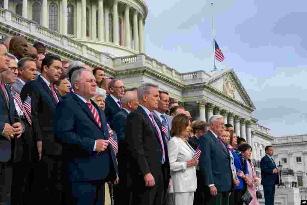 Members of Congress gather at the Capitol in Washington to observe the anniversary of the Sept. 11, 2001, terror attacks, Sept. 11, 2019.