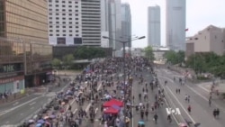 Hong Kong Protests Draw New Supporters on National Holiday