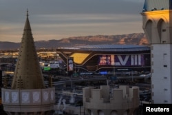 The rising sun illuminates the Allegiant Stadium, where Super Bowl LVIII will take place, in Las Vegas, Nevada, U.S., on January 24, 2024. (REUTERS/Carlos Barria)