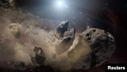 Image courtesy of NASA shows an artist's concept of a broken-up asteroid. Scientists think that a giant asteroid, which broke up long ago in the main asteroid belt between Mars and Jupiter, eventually made its way to Earth and led to the extinction of the dinosaurs.