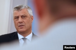 FILE - Kosovo's President Hashim Thaci speaks during an interview with Reuters in his office in Pristina, Kosovo, Feb. 13, 2018.