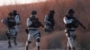 Mexican National Guard members patrol along the Mexico-US border in Ciudad Juarez, Feb. 5, 2025. 