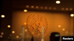 FILE - The United Nations logo is seen at the 2019 United Nations Climate Action Summit at U.N. headquarters in New York, U.S., Sept. 23, 2019. 