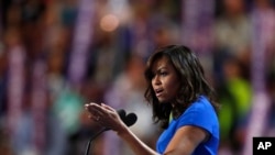 First Lady Michelle Obama speaks during the first day of the Democratic National Convention in Philadelphia, Monday, July 25, 2016. (AP Photo/Paul Sancya)