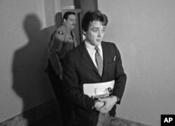 FILE - Robert Beausoleil, then 21, leaves a courtroom in Los Angeles, Jan. 21, 1970.